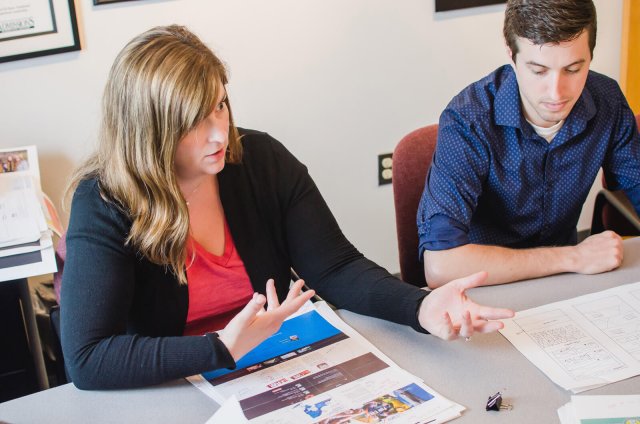 Team reviewing design mockups